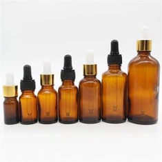 Bouteille en verre avec pipette compte-gouttes