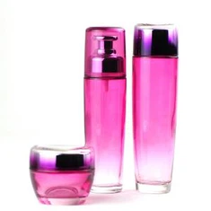 Flacon pompe en verre rose rouge